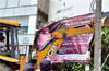 Unauthorised hoardings brought down